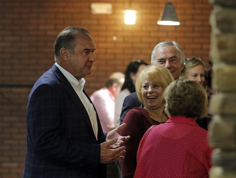 Missouri Lt. Gov. Mike Kehoe socializes with supporters shortly after arriving to his election watch party on Tuesday, Nov. 3, 2020, at Capital Bluffs Event Center in Jefferson City.