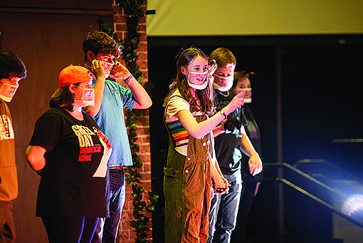 Tiger Theatre Company student Lia Graham recites lines in a warm-up exercise during a rehearsal for "Puffs, or Seven Increasingly Eventful Years at a Certain School of Magic and Magic."