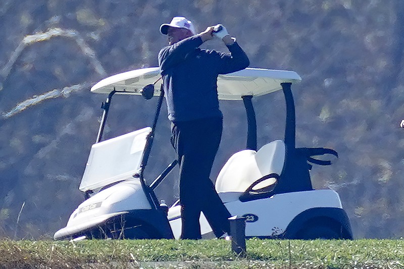 President Donald Trump plays a round of Golf at the Trump National Golf Club in Sterling Va., Sunday Nov. 8, 2020. (AP Photo/Steve Helber)