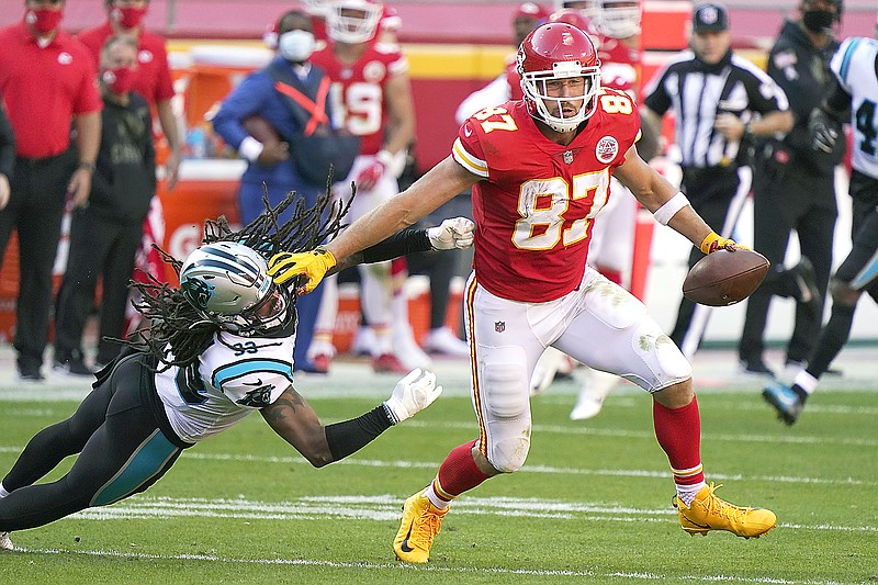Chiefs tight end Travis Kelce sheds the tackle attempt of Panthers free safety Tre Boston during the second half of Sunday afternoon's game at 