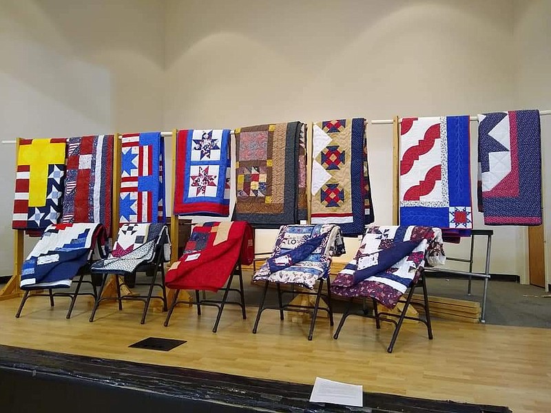 <p>Submitted</p><p>A total of 16 Moniteau County veterans were honored last Saturday at a presentation of Quilts of Valor, which are annually presented to area veterans by the Bookworm Quilters.</p>