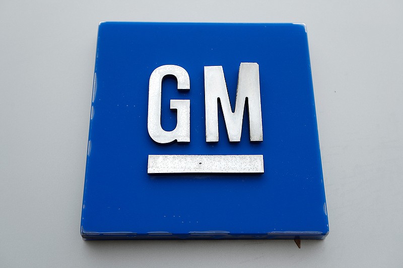 This Jan. 27, 2020 file photo shows the General Motors logo in Hamtramck, Mich. On Monday, Nov. 9, 2020, General Motors says it will hire 3,000 more technical workers by early 2021 to help with virtual product testing and to develop software as a service. (AP Photo/Paul Sancya, File)