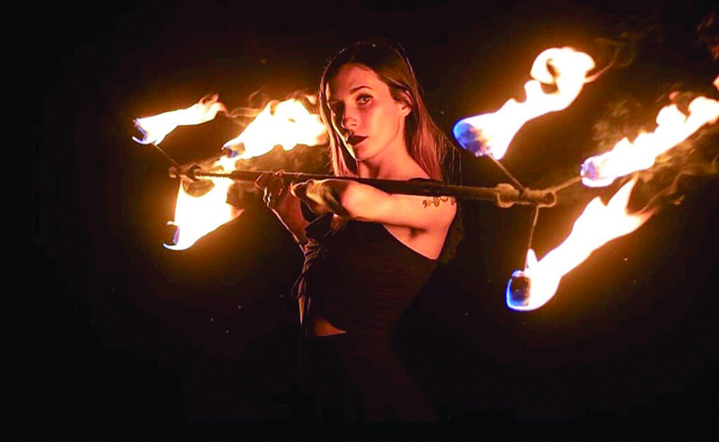Lindsey Elise Cummings is a fire spinner who will perform in Saturday's Universal Vibe event.