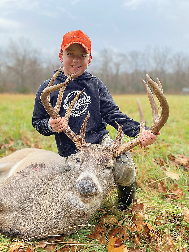 Payton Groose poses with his buck.