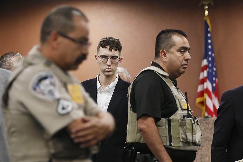 FILE - In the is Oct. 10, 2019 file photo, El Paso Walmart shooting suspect Patrick Crusius pleads not guilty during his arraignment in El Paso, Texas. Hate crimes across the U.S. rose to the highest level in more than a decade as federal officials also recorded the highest number of hate-motivated killings since the FBI began collecting hate crime data in the early 1990s. An FBI report released Monday showed there were 51 hate crime murders in 2019. That includes 22 people who were killed in a shooting that targeted Mexicans at a Walmart in the border city of El Paso, Texas in August 2019. (Briana Sanchez / El Paso Times via AP, Pool, File)