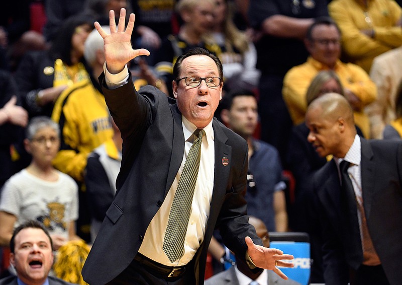 In this March 16, 2018, file photo, Wichita State head coach Gregg Marshall reacts during the first half of a first-round NCAA college basketball tournament game against Marshall in San Diego. Marshall resigned Tuesday, Nov. 17, 2020, following an investigation into allegations of verbal and physical abuse, ending a tenure that soared to the Final Four and crashed on the eve of the upcoming season. (AP Photo/Denis Poroy, File)