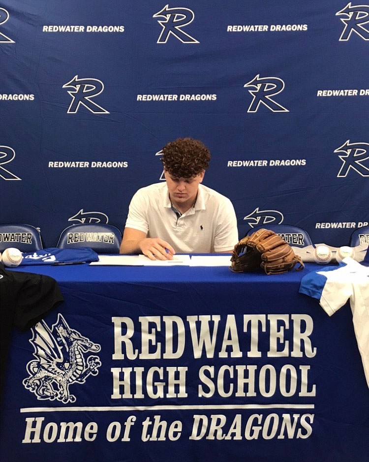 Redwater's Preston Davis signs his letter of intent to play baseball for the University of Arkansas-Little Rock on Wednesday. (Submitted photo)
