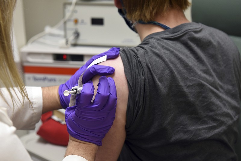 FILE - This May 4, 2020, file photo provided by the University of Maryland School of Medicine, shows the first patient enrolled in Pfizer's COVID-19 coronavirus vaccine clinical trial at the University of Maryland School of Medicine in Baltimore.  Pfizer announced Wednesday, Nov. 18, 2020, more results in its ongoing coronavirus vaccine study that suggest the shots are 95% effective a month after the first dose. (Courtesy of University of Maryland School of Medicine via AP, File)