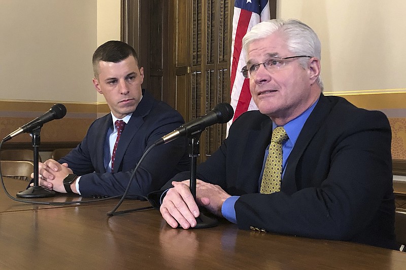 FILE - In this Jan. 30, 2020 file photo, Senate Majority Leader Mike Shirkey, R-Clarklake, right, and House Speaker Lee Chatfield, R-Levering, left, speak to the media at the Michigan Capitol in Lansing, Mich.  Shirkey and Chatfield are headed to the White House on Friday as President Donald Trump made an extraordinary and sure-to-be futile attempt to block Joe Biden's victory in the battleground state and subvert the results of the 2020 presidential election. (AP Photo/David Eggert)