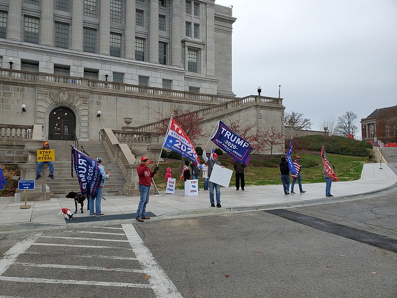 Supporters of President Trump rally outside the west entrance to the Missouri Capitol on Saturday, Nov. 21, 2020.