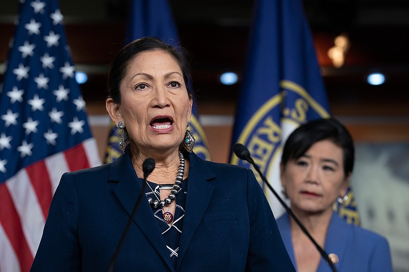 In this March 5, 2020, file photo Rep. Deb Haaland, D-N.M., Native American Caucus co-chair, joined at right by Rep. Judy Chu, D-Calif., chair of the Congressional Asian Pacific American Caucus, speaks to reporters about the 2020 Census on Capitol Hill in Washington. O.J. Semans is one of dozens of tribal officials and vote activists around the country pushing selection of Haaland to become the first Native American secretary of Interior.  (AP Photo/J. Scott Applewhite, File)