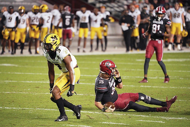 Missouri safety Martez Manuel celebrates after sacking South Carolina's Collin Hill in the first half of Saturday's game in Columbia, S.C.