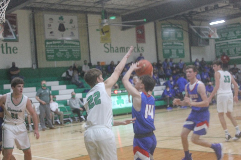 <p>Democrat photo/Kevin Labotka</p><p>Kaden Keeran goes up against a defender during the Pintos’ loss to New Haven on Nov. 20.</p>