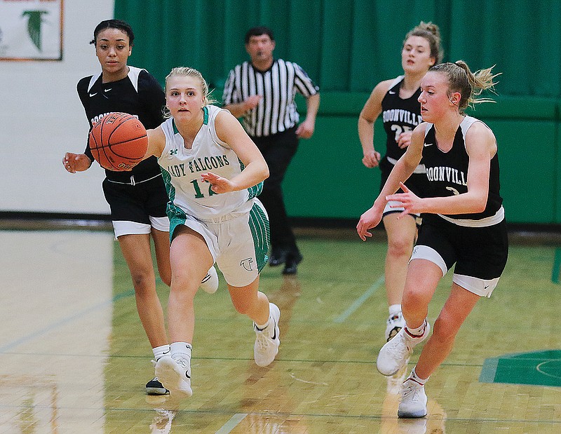 Blair Oaks' Bailey Rissmiller sprints down the court with the ball during a game last season against Boonville in Wardsville.