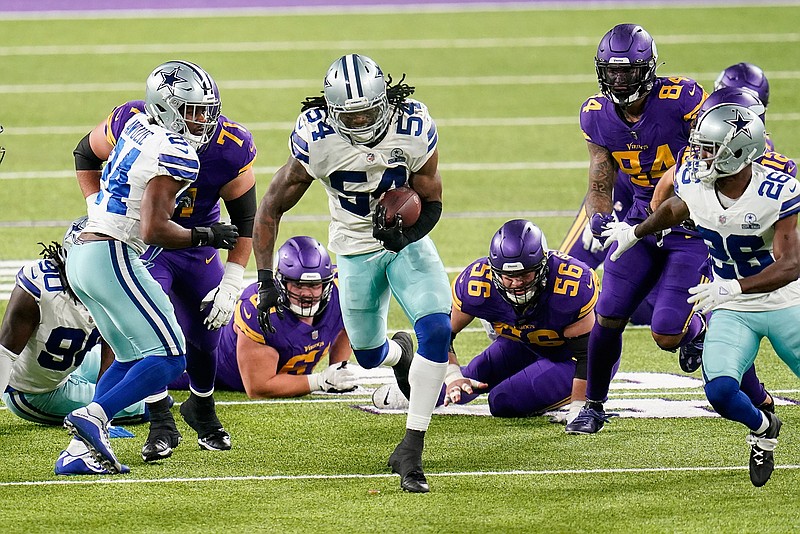 Dallas Cowboys linebacker Jaylon Smith (54) returns a fumble by Minnesota Vikings running back Dalvin Cook during the first half Sunday, November 22, 2020, in Minneapolis.