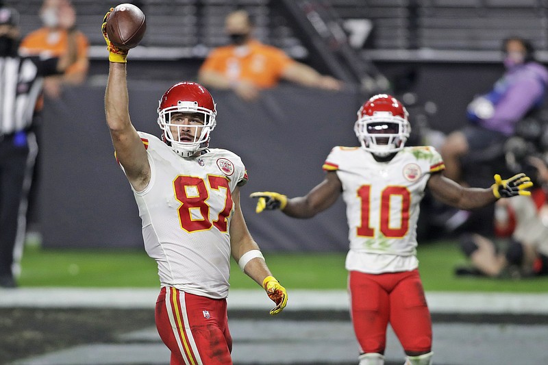 Chiefs tight end Travis Kelce celebrates after scoring a touchdown in the final minute of Sunday night's game against the Raiders in Las Vegas.