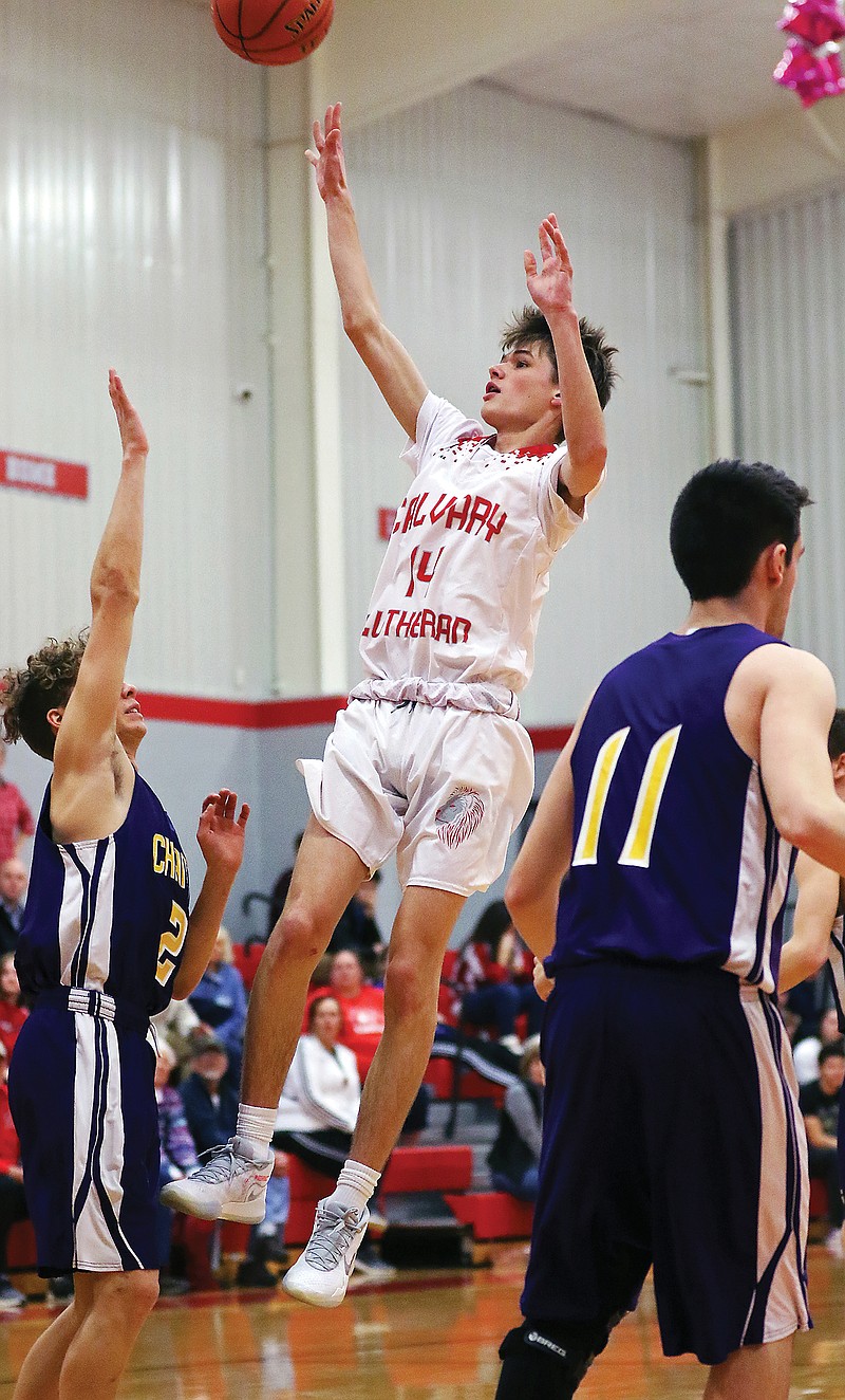 Calvary Lutheran's Will Struttmann releases a shot during a game last season against Chamois at Calvary Lutheran.
