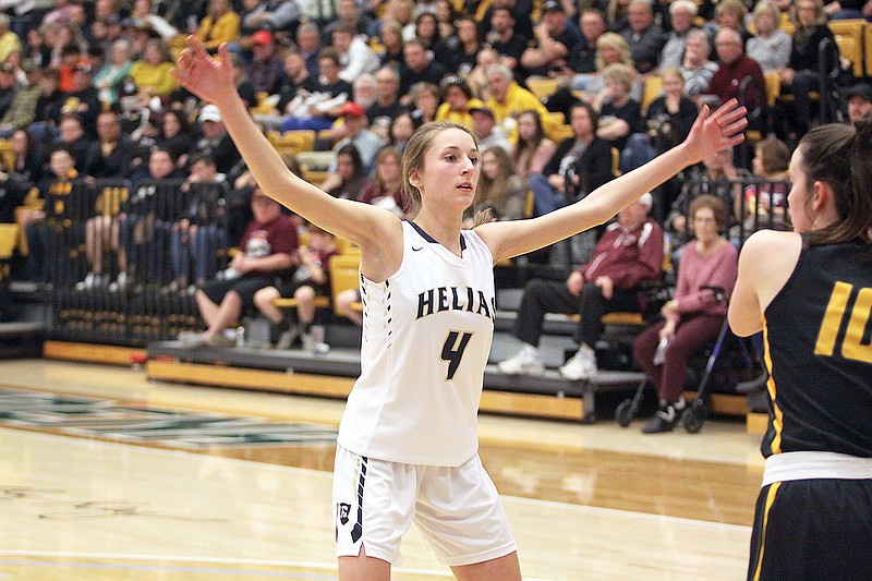 Kylie Bernskoetter of Helias guards the in-bounds pass during last season's Class 4 sectional game against Sullivan in Rolla.