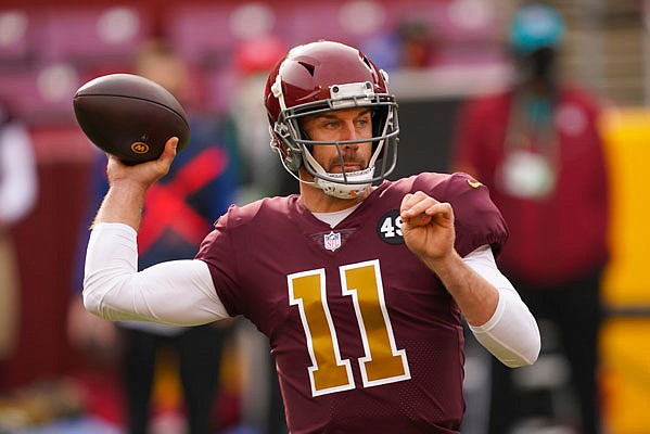Washington Football Team quarterback Alex Smith throws a pass during last Sunday's game against the Bengals in Landover.