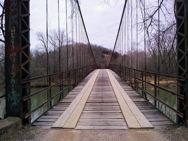 These photos were submitted as part of the Save The Historical Brumley Swinging Bridges group's 29-page history of the bridge. Missouri's Historic Preservation Council said it can still be referred to as a "swinging bridge" as the original construction has remained intact. "In this regard, the bridge retains its historic character of the early 20th century," the Council said in a July 2020 meeting. It was officially designated Oct. 8, 2020, in the National Register of Historic Places. (Courtesy of Kelly Warman-Stallings)