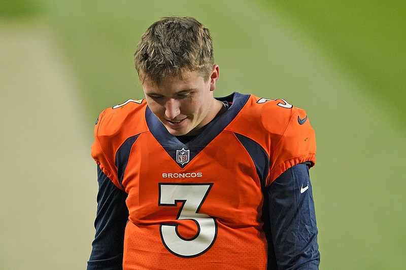 Broncos quarterback Drew Lock leaves the field following last Sunday's win against the Dolphins in Denver.