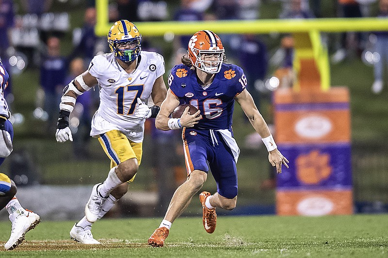 Clemson quarterback Trevor Lawrence runs with the ball during the third quarter of Saturday's game against Pittsburgh in Clemson, S.C.