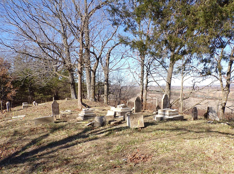 Courtesy of Nancy Thompson: Volunteers are restoring and repairing decades of vandalism at the Dulle Farm Cemetery that sits on a Missouri River bluff west of Jefferson City.