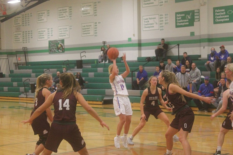 <p>Democrat photo/Kevin Labotka</p><p>The California Pintos girls basketball team started its season Nov. 30 with a 71-46 win over Osage in their first round game of the Tri-County Conference Tournament.</p>