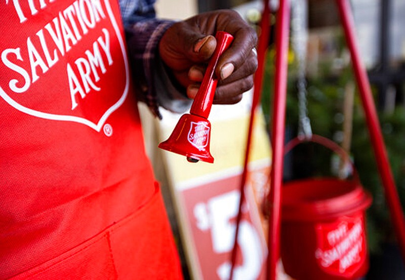 Salvation Army bell ringer Ivory Carter Sr. rings a bell Nov. 23 to raise funds for The Salvation Army outside the Market Street store on 42nd Street in Odessa, Texas. season. If you're fortunate enough to be able to donate money this year, there are plenty of causes that need attention.  Causes can be supported both through monetary gifts and donations of your time.  (Jacob Ford/Odessa American via AP, File)