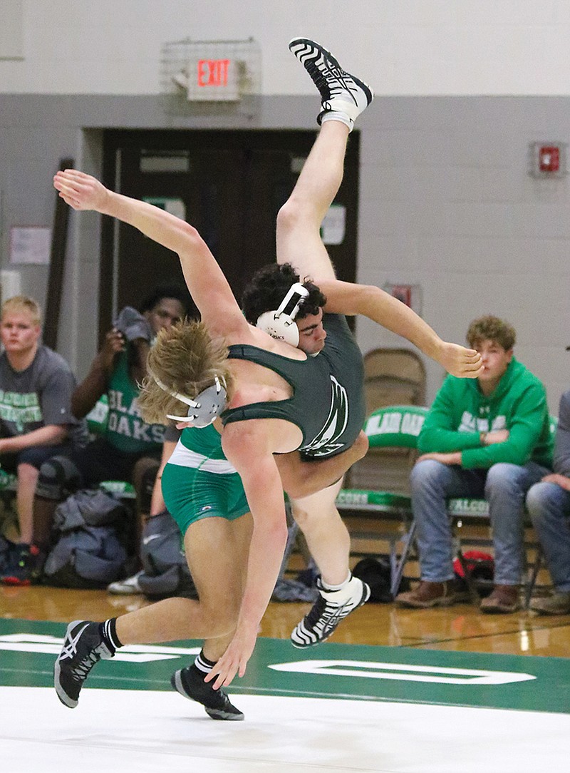 Eli Batiste of Blair Oaks takes Grant Wright of North Callaway to the mat during a match last season in Wardsville.