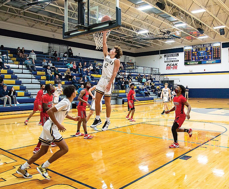 Joe Rembecki of Helias goes up for a shot during Monday night's game against Lift for Life Academy at Rackers Fieldhouse.