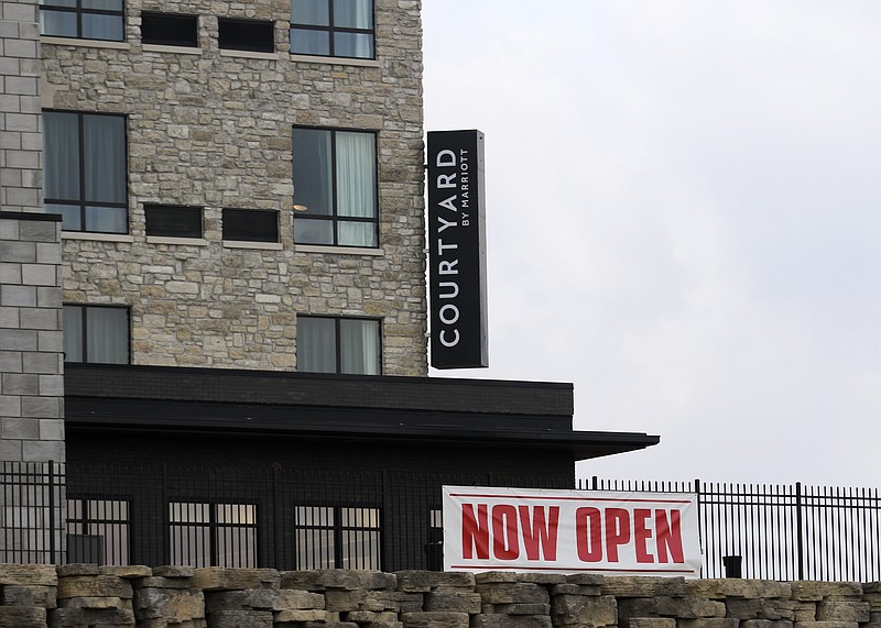 Liv Paggiarino/News Tribune

A sign outside of the new Courtyard Marriot denotes the hotel as now open on Wednesday. 