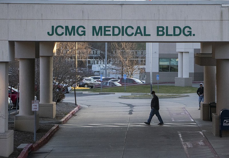 Liv Paggiarino/News Tribune photo: People walk in and out of Jefferson City Medical Group on Thursday afternoon, Dec. 17, 2020.