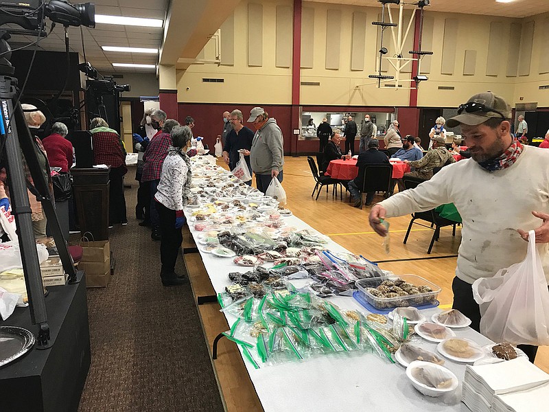 Various local public service employees collected inside the First Baptist gym Friday to be a part of the church's fifth annual Unsung Heroes' Lunch Celebration.