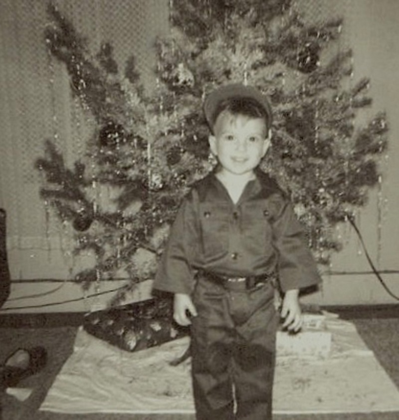 John Moore in 1966, showing off the new military uniform he received after returning from a drive to search the skies for Santa's sleigh.