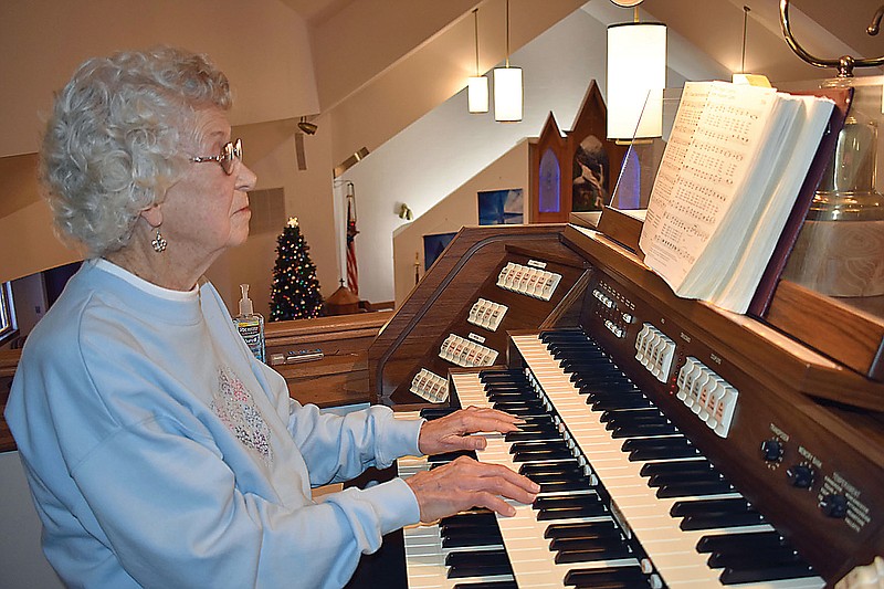 Norma Engelbrecht plays the organ Sunday at Immanuel Lutheran Church. She has served at organist for 63 years.