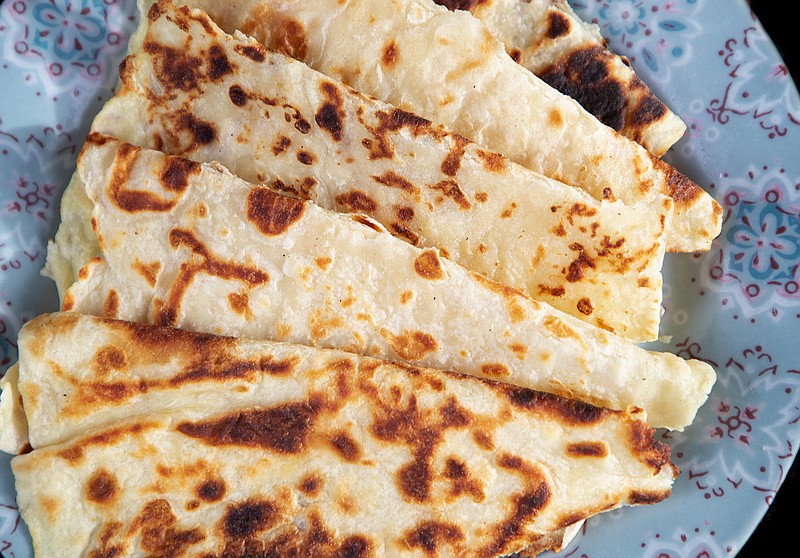 Charles Schrag of Seattle has been making the traditional Norwegian food lefse since he was young. Schrag shows off his lefse, which is similar to a flatbread, made with potatoes near his Seattle-area home Dec. 7, 2020. (Mike Siegel/The Seattle Times/TNS)