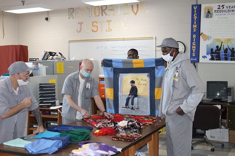 <p>Courtesy Kevin Yancey, JCCC Restorative Justice coordinator</p><p>From left to right, offenders Timmy Jackson, Keith Lindhardt, Gerald Johnson and Jeron Atkins, of the Jefferson City Correctional Center Restorative Justice Organization, help make quilts. The quilts and blankets made go to nonprofits and emergency needs.</p>
