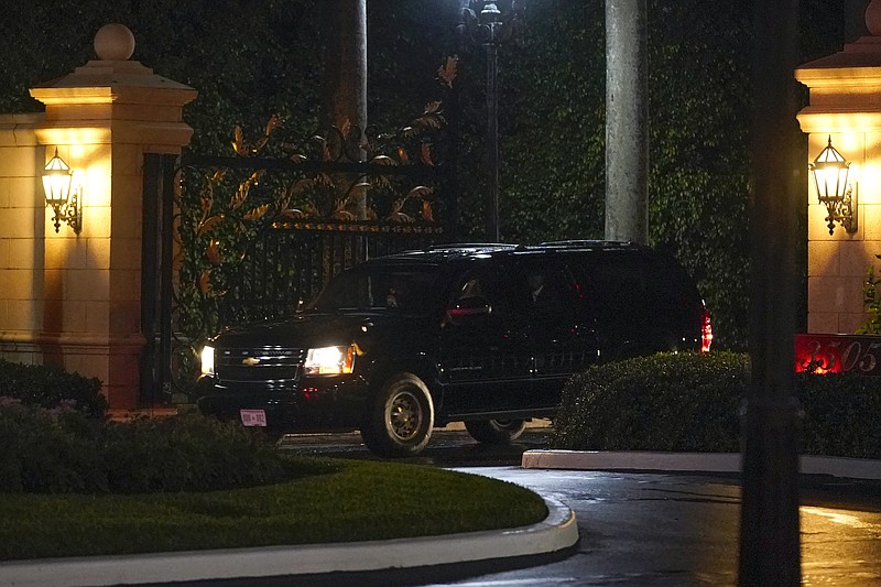 President Donald Trump's motorcade departs Trump International Golf Club, Sunday, Dec. 27, 2020, in West Palm Beach, Fla. Trump is returning to his Mar-a-Lago resort in Palm Beach, Fla. (AP Photo/Patrick Semansky)