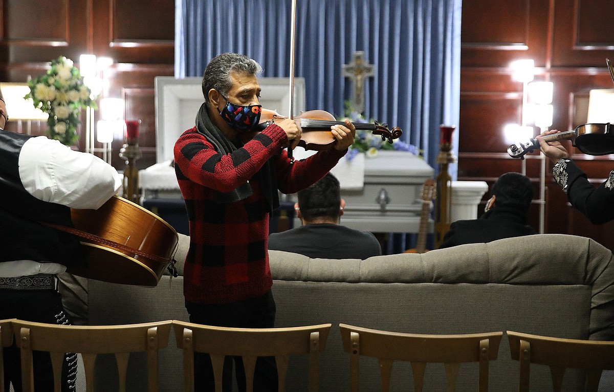 Mariachis sing farewell to fellow players at their wakes and funerals