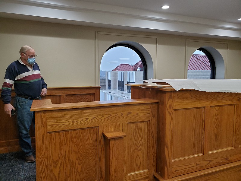 Cole County Presiding Judge Jon Beetem looks over work being done to make a new courtroom on the top floor of the Cole County Courthouse. Work is scheduled to be completed by mid- Jan.
