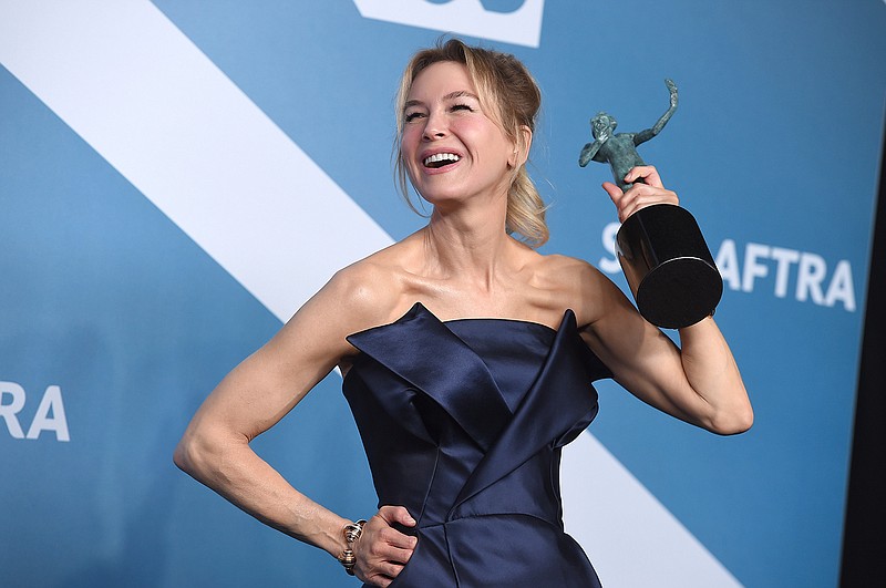 Renee Zellweger poses in the press room with the award for outstanding performance by a female actor in a leading role for "Judy" at the 26th annual Screen Actors Guild Awards on Jan. 19, 2020, in Los Angeles. Zellweger has earned her first Grammy nomination this year. The "Judy" soundtrack, which features Zellweger covering songs like "Over the Rainbow" and "The Trolley Song," is nominated for best traditional pop vocal album. (Photo by Jordan Strauss/Invision/AP, File)