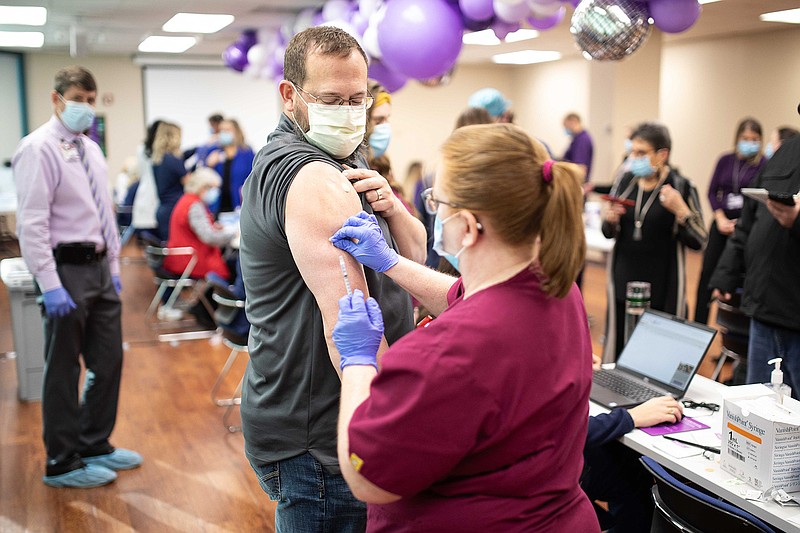 Dr. Jason Harris, medical director of the Emergency Department at Christus St. Michael Health System, was among the first in Texarkana to receive the COVID-19 vaccine. The hospital received the shipment of vaccines at 10 a.m. Dec. 17 and offered it to their front-line workers that afternoon.