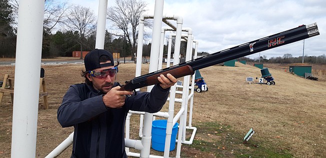  John Calandro, a clay/trap shooting enthusiast from Dallas, takes aim at Rocky Creek USA's clay shooting range. "Dallas didn't have any good ones this weekend," he said. "Besides, this gave me a chance to scout out the range, get a lay of the land, when the prize money tournaments come up."