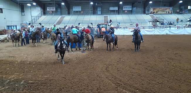 Winners line up for recognition at Saturday's team roping event at Four States Fair Rodeo Arena. According to officials from VIP Team Roping, events like these are how competitors qualify for the higher level championships throughout the year.