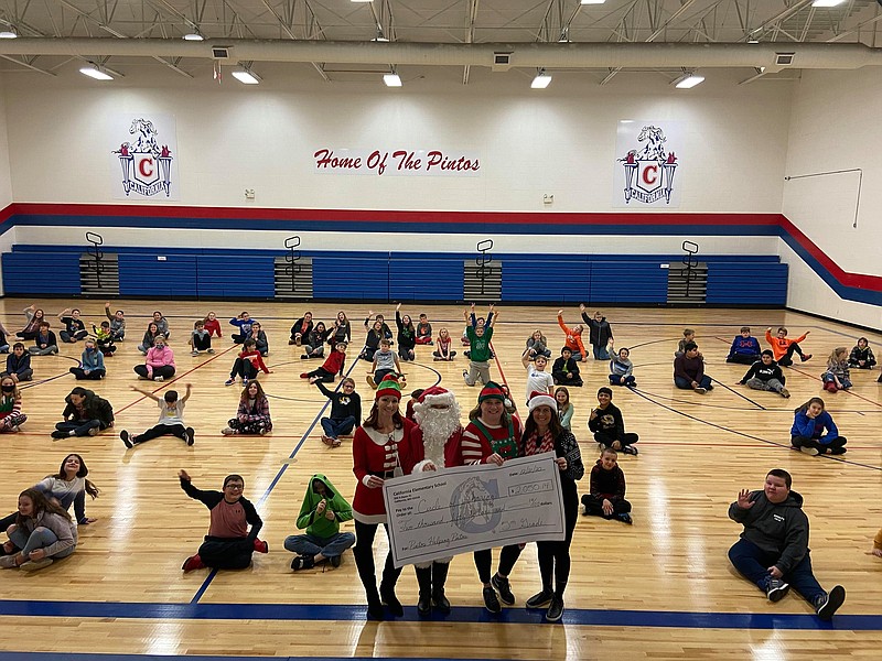 <p>Submitted photo</p><p>California Elementary School students were able to raise more than $2,000, put toward gift cards that were given to members of the community before Christmas, through the school’s annual Circle of Sharing.</p>