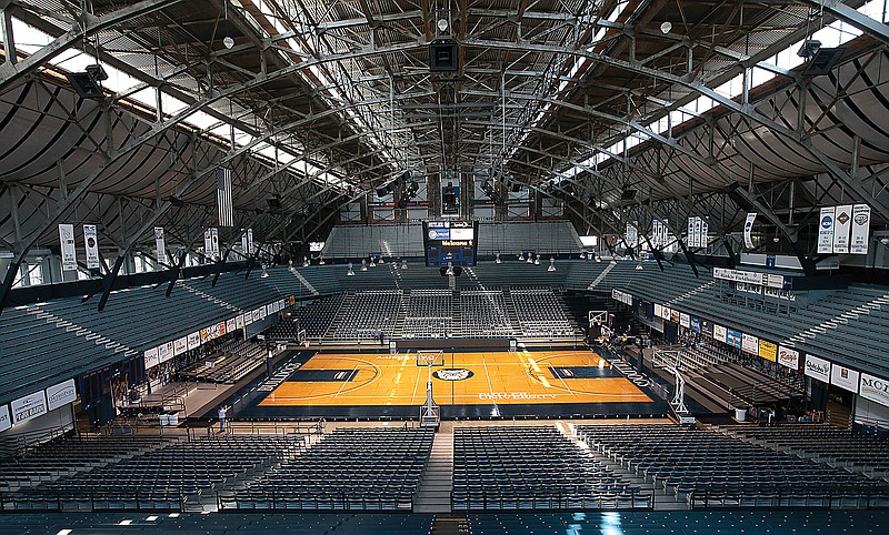 In this March 30, 2010, file photo, light shines through the windows onto the basketball court at Butler University's Hinkle Fieldhouse in Indianapolis.