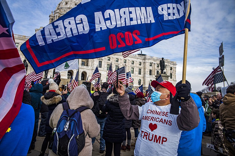 Protesters attended a rally in support of President Donald Trump on the steps of the Minnesota State Capitol on Wednesday, Jan. 6, 2021, in St. Paul, Minn.