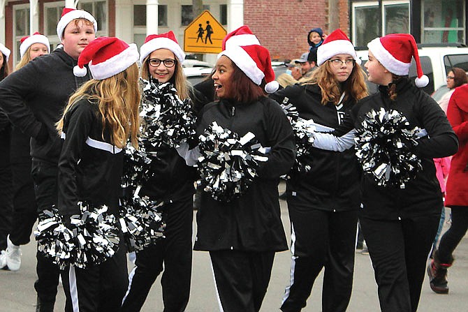 North Callaway High School cheerleaders, as well as the marching band and drill team, marched in Auxvasse's 2020 Christmas parade.