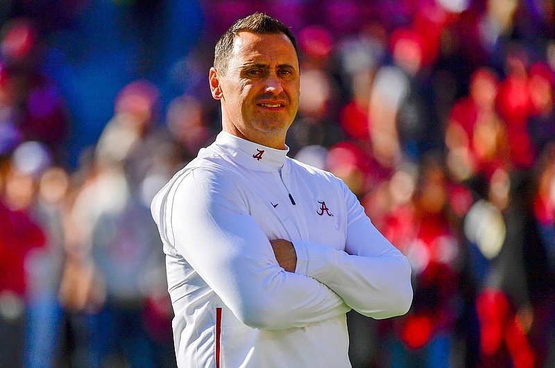  In this Nov. 9, 2019, file photo, Alabama offensive coordinator Steve Sarkisian watches warmups before an NCAA football game against LSU in Tuscaloosa, Ala. Texas has hired Sarkisian as the Longhorns new coach. The move comes just a few hours after Texas announced the firing of Tom Herman after four seasons with no Big 12 championships. (AP Photo/Vasha Hunt, File)